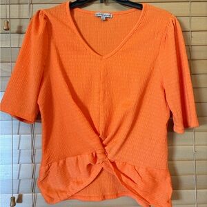 Rylee Moon NWOT Beautiful Vibrant Orange V-Neck Twist Blouse. Size Large